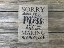 "Sorry About The Mess..." Burlap Print Sign - Mm